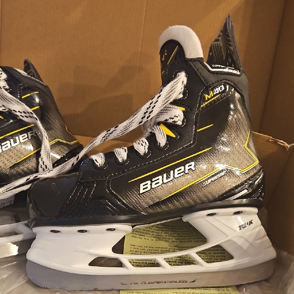 Bauer Black Hockey Skates with Yellow Trim